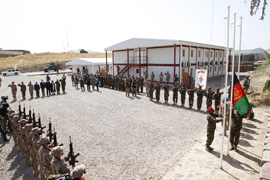 Izado de la bandera afgana en la base ‘Ruy González de Clavijo’