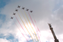 La Patrulla Aguila del Ejército del Aire realiza una pasada al durante el acto de homenaje a los caidos en la Plaza de Colón