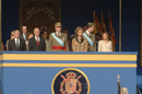 SS. MM. los Reyes de España, presiden en la plaza de Colón los actos conmemorativos del día de la Fiesta Nacinal y el desfile militar,a lo largo del Paseo de la Castellana