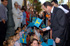 José Bono, ministro de Defensa, saluda después del acto a un grupo de escolares