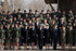 La vicepresidenta primera del Gobierno, el ministro de Defensa, el JEMAD, el JEME y el AJEMA, se fotografian junto a un grupo de mujeres militares.