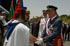 SM El Rey saluda a los jefes de las unidades participantes en el desfile del Día de las Fuerzas Armadas celebrada en Sevilla