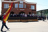 Sus Majestades los Reyes y las autoridades que presiden el desfile saludan a la Bandera en la Academia Básica del Aire