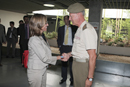 La ministra de Defensa, Carme Chacón es recibida a su llegada a la Expo por el General Pinto