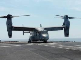 An Osprey V-22 duly lashed on the deck