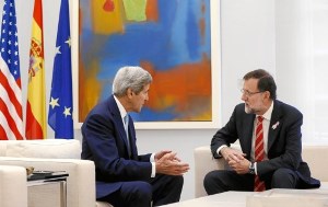 Mr. Kerry chats with the Spanish Prime Minister