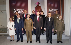 His Majesty the King with asisting representatives at the exhibit opening