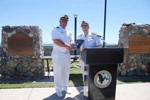 The Spanish Naval Attaché greets Captain Howard Warner, Commanding Officer at Naval Base Point Loma