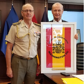 General Armisén delivers spanish flag to ambassador Morenés