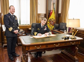 VAdm. Carter signing the Guests Book