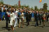 La Familia Real, el presidente de Andalucía y el ministro de Defensa, saludan al público en Sevilla al finalizar el desfile del Día de la Fuerzas Armadas