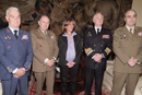 La ministra de Defensa Carme Chacón acompañada por la cúpula militar
