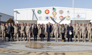 La vicepresidenta del Gobierno, Soraya Saénz de Santamaria, el ministro de Defensa, Pedro Morenés, y autoridades militares junto al  contingente español desplegado en la base de Herat en Afganistán.