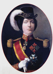 Foto: S.M. la Reina Isabel II luciendo la Placa y Banda de la Gran Cruz de la Orden.