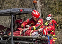 Evacuación de un herido simulado durante el transcurso del día del visitante distinguido (DVD)