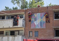Momento de la demostración dinámica de Búsqueda y Rescate Urbano por parte del equipo USAR del BIEM I