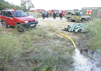 El tendido de mangueras se extendió por el interior del túnel desde la Devesar a Sarriá
